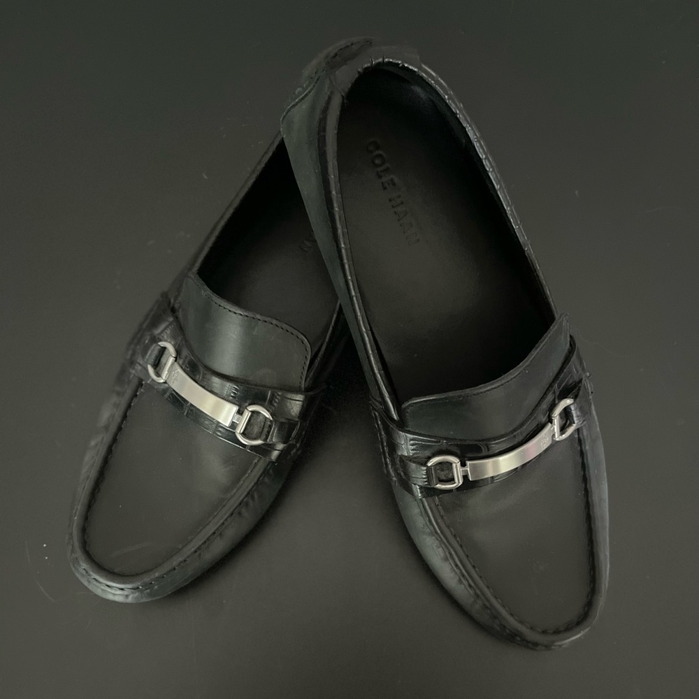 NWOT. Cole Haan Men’s size 11. Black leather slip-ons/driver shoes.